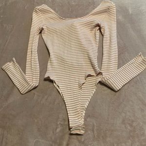 Pink and White body suit